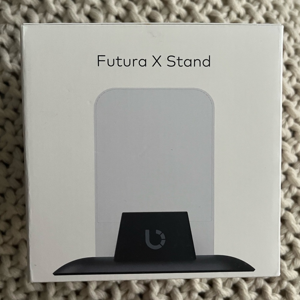 BEZALEL ;The Futura X phone charger stand is new in a box.